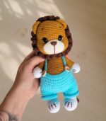 Lion in Blue Shorts by Myrtilus
