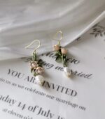 Myrtilus Asymmetric Freshwater Pearl Earrings – Handmade with Butterfly & Orchid Motifs