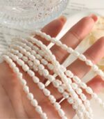 Myrtilus Baroque Freshwater Pearl Necklace – Oval Rose Pendant with Gold-Plated Stainless Steel