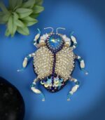 Myrtilus Moonlit Wing – Handmade Celestial White Bug Brooch