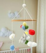 Handmade Crochet Elephant Baby Mobile by Myrtilus—crafted from 100% cotton to soothe and delight. A soft, charming nursery décor and perfect baby gift.