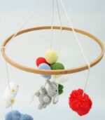 Handmade Crochet Elephant Baby Mobile by Myrtilus—crafted from 100% cotton to soothe and delight. A soft, charming nursery décor and perfect baby gift.