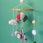 Handmade Crochet Elephant Baby Mobile by Myrtilus—crafted from 100% cotton to soothe and delight. A soft, charming nursery décor and perfect baby gift.