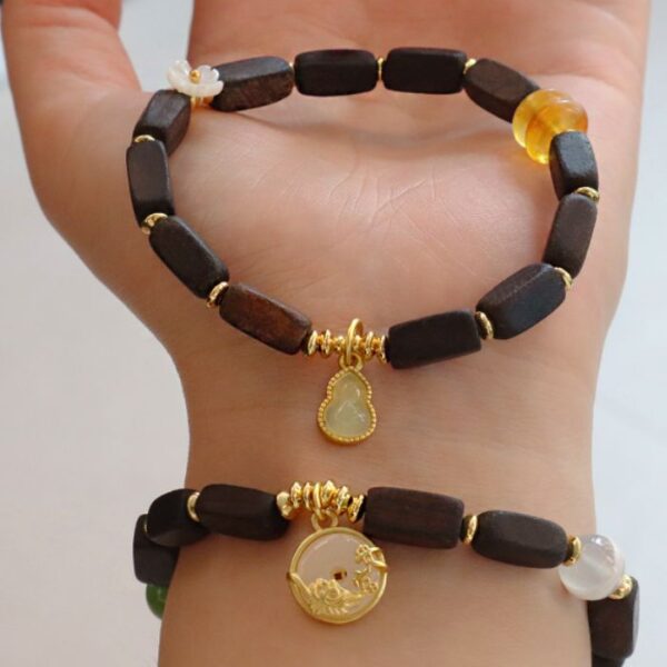 Myrtilus Agarwood Charm Bracelet-Natural Beads with Golden Accents