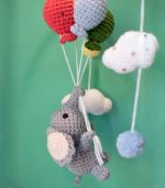 Handmade Crochet Elephant Baby Mobile by Myrtilus—crafted from 100% cotton to soothe and delight. A soft, charming nursery décor and perfect baby gift.