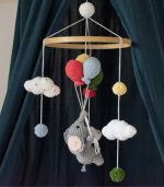 Handmade Crochet Elephant Baby Mobile by Myrtilus—crafted from 100% cotton to soothe and delight. A soft, charming nursery décor and perfect baby gift.