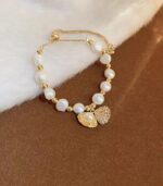 Myrtilus Natural Pearl Bead Bracelet – Elegant Gold-Accented Shell Charm Jewelry